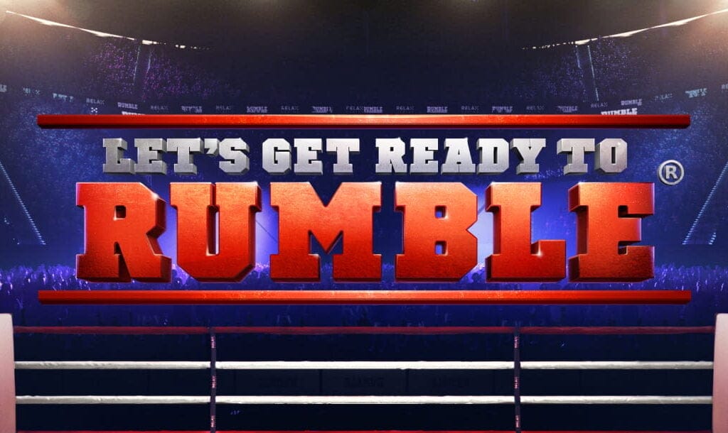 The game title “Let’s Get Ready to Rumble” appears in silver and red capital letters above a boxing ring and against the background of a cheering crowd in a stadium under lights.