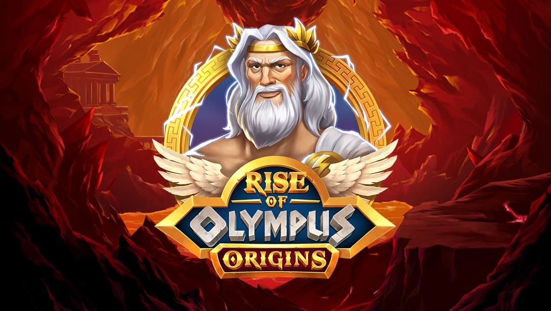 Banner for the slot game Rise of Olympus Origins featuring a powerful Zeus-like figure with white hair and beard, wearing a golden laurel crown. The character is set against a glowing background framed by a circular golden Greek pattern. The scene is surrounded by a cavern with jagged red rock walls, with ancient temple structures visible in the distance. The game logo includes wings and bold, gold-and-blue lettering.
