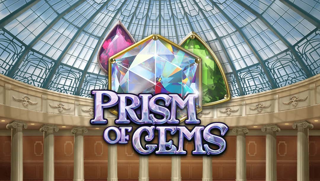 The Prism of Gems logo featuring a diamond, ruby, and emerald above and behind the game’s title. The letters and gems reflect light with shining lens effects. The background is a circular room with a large glass dome supported by marble pillars.