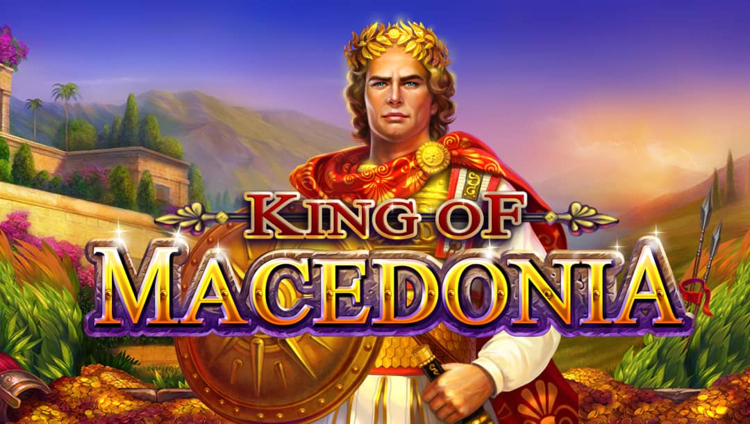 The game title King of Macedonia appears in red and gold letters in front of an ancient Macedonian king in robes, armor, and shield, and wearing a crown of golden leaves. In the background is a hilly landscape with trees and a fortress.
