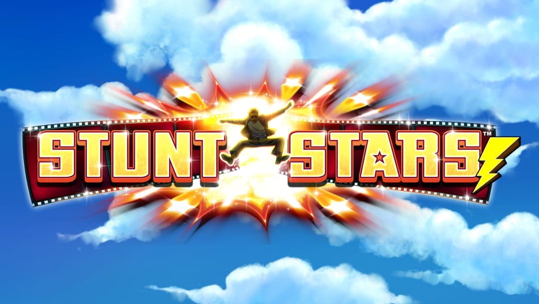 The Stunt Stars slot title screen, featuring blue skies and fluffy clouds with the game logo exploding onto the screen, complete with the signature stunt actor flying out of the explosion.