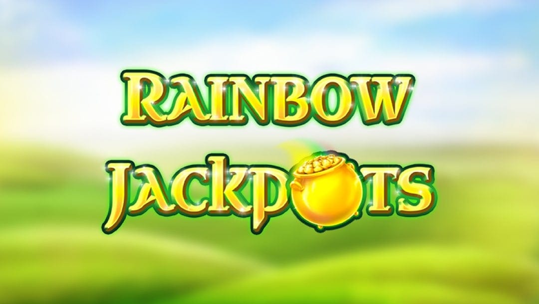 The Rainbow Jackpots game title screen featuring a frosted-blur background of green meadows under a clear blue sky. The game’s logo floats in the foreground in green and gold text with a pot of gold replacing the letter O in the word Jackpots.