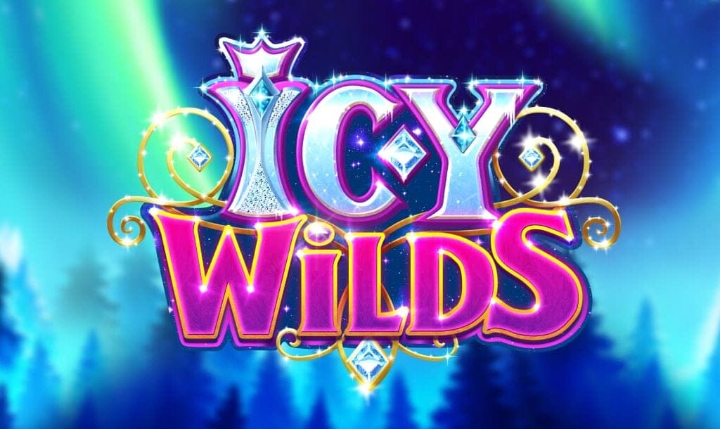 Logo for the slot game "Icy Wilds" displayed in frosty, jewel-encrusted letters with a glowing crown atop the "I". The background features a mystical, snow-covered forest with glowing auroras in the sky, giving a magical winter atmosphere.