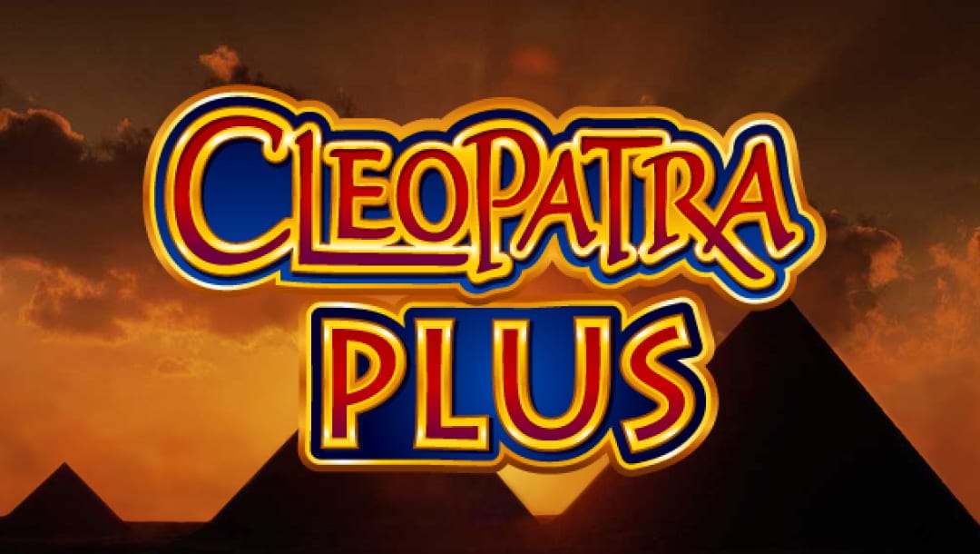 The title screen of the Cleopatra Plus slot game featuring the game’s bold, ornate logo in red, gold, and blue stylized lettering centered against a dramatic Egyptian sunset. In the background, dark silhouettes of pyramids rise from the horizon, set beneath a glowing sky of amber and crimson clouds.